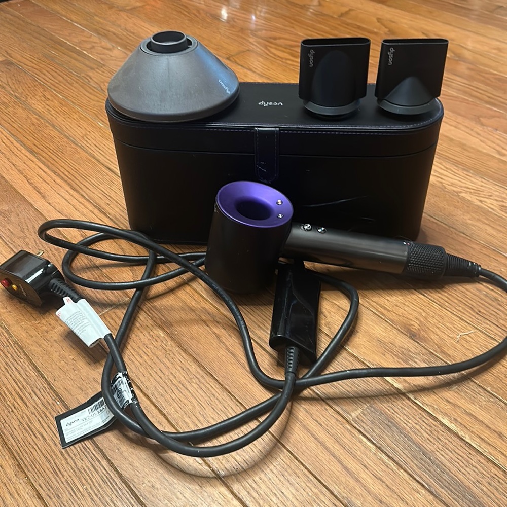 Dyson supersonic hair dryer with three attachments and storage case